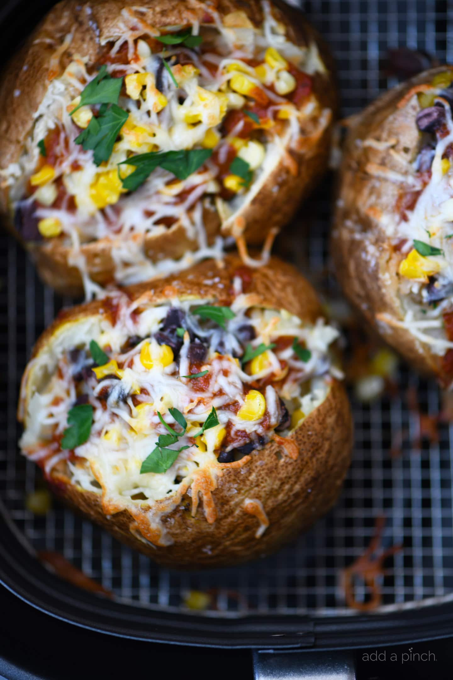 Quick Air Fryer Enchilada Stuffed Baked Potatoes for Weeknights